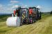 Kuhn 3135 rundballepresse på jordet.